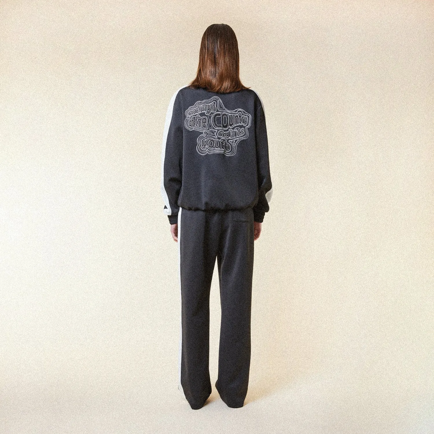 STRENGTH TRACK TOP - BLACK/WHITE